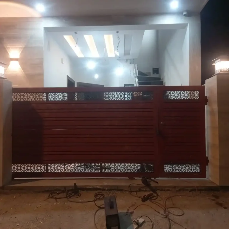 Steel main gate with decorative panels